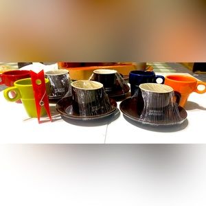 Four small expressions cups and saucers. With colored mini mugs